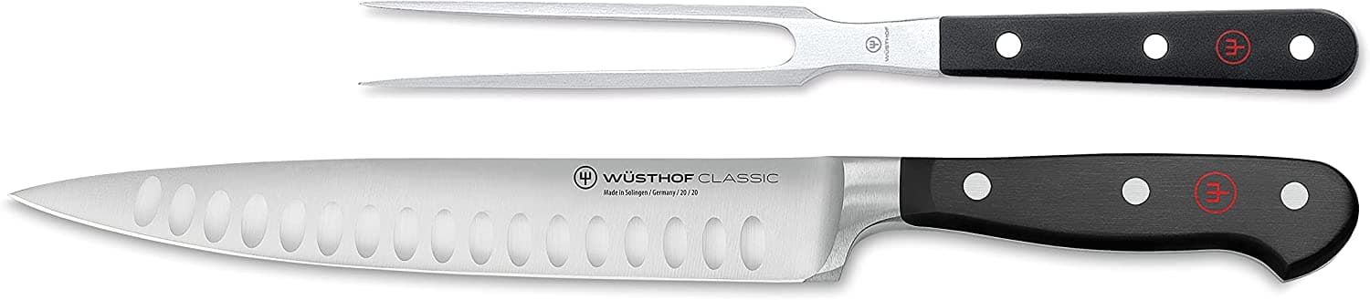 https://ml3tdgav6wmp.i.optimole.com/w:1500/h:329/q:mauto/f:best/https://choppnknives.com/wp-content/uploads/2023/06/WUSTHOF-Classic-9-Hollow-Edge-Carving-Knife.jpg